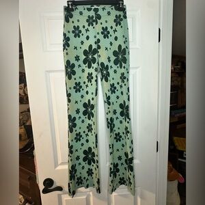 Urban Outfitters Green and Black Patterned Apparel. Flower Flare Pants.